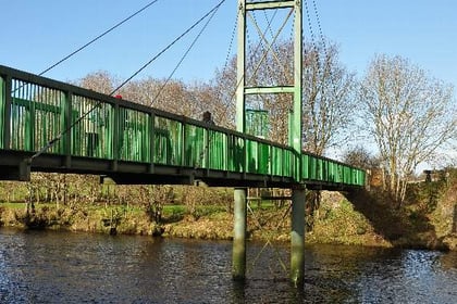 Bridge 'divides communities' and holds up cycle route