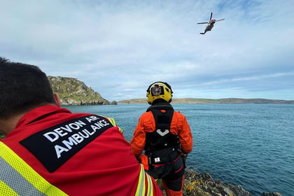 Fisherman winched to safety 