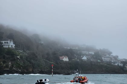 Salcombe RNLI rescue children,  adults and a dog from capsized RIB