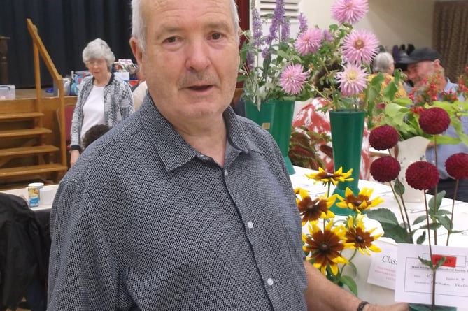 Norman Veitch with his prize winning pom-pon dahlias