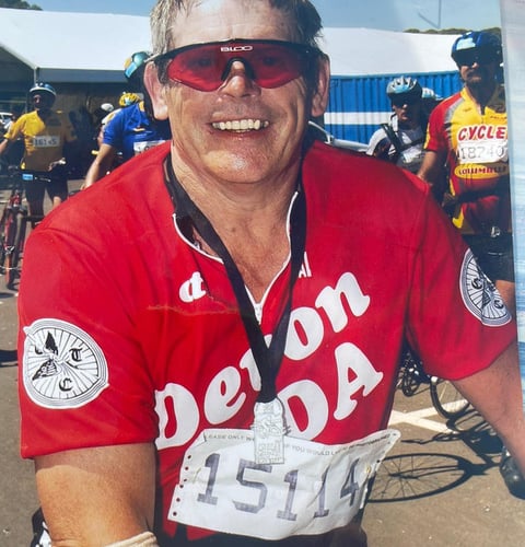 Robin cycling the Argus race in South Africa in 2002