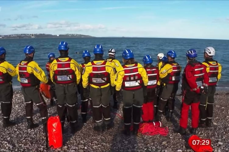 Team prepare to enter the water